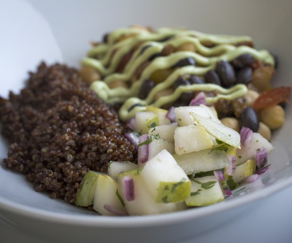Vegetarian taco bowls with fresh pears and avocado creme