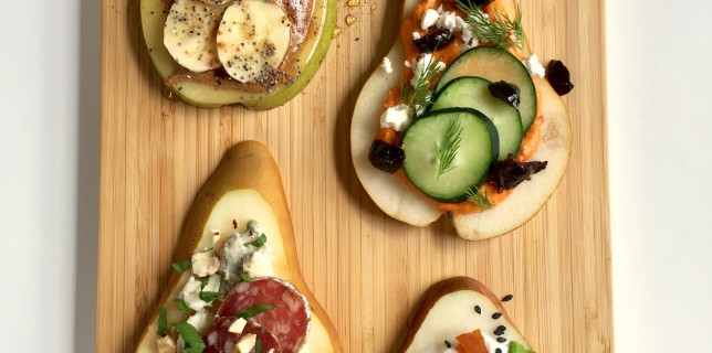 Pears sliced lengthwise topped with delicious toppings